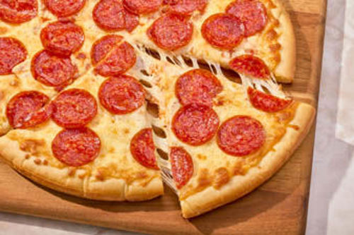 Little Caesars pepperoni pizza kit with pizzas and ingredients